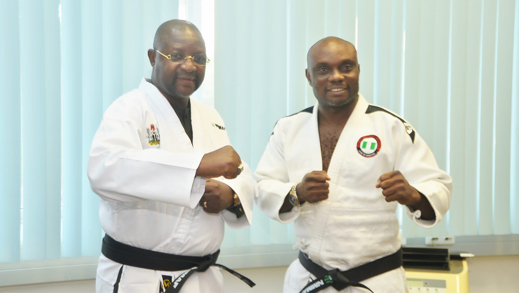 NMMAF Confers Honourary MMA Black Belt Award on Sunday Dare
